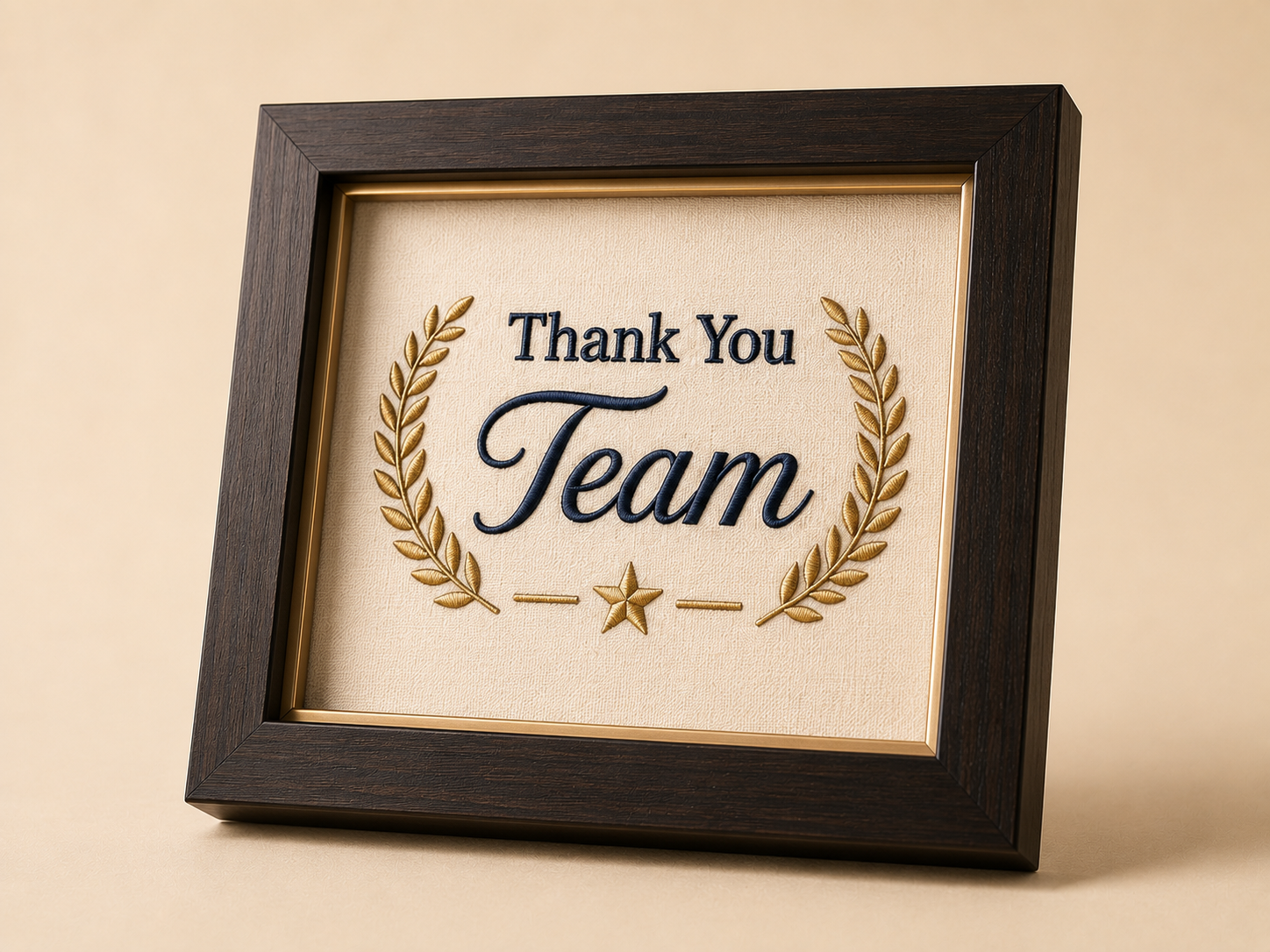 Corporate embroidered frame with navy and gold crest on cream