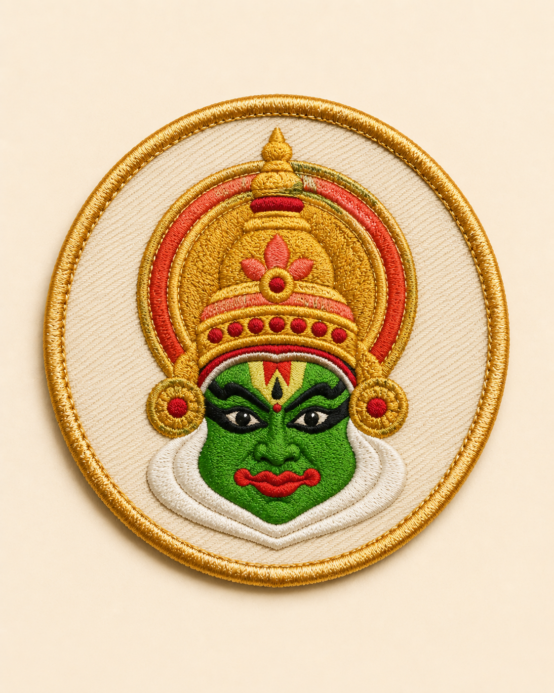 Round embroidered Kathakali face patch with a gold merrow border