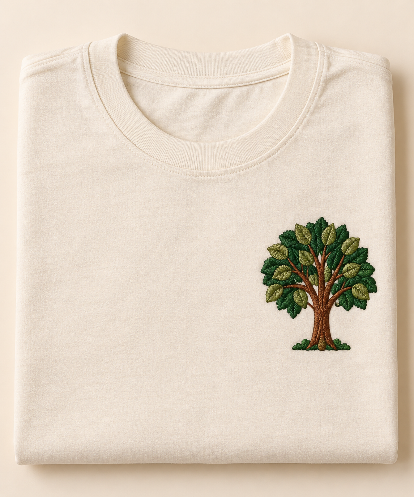 Machine-embroidered sal forest tree on a t-shirt, Jharkhand
