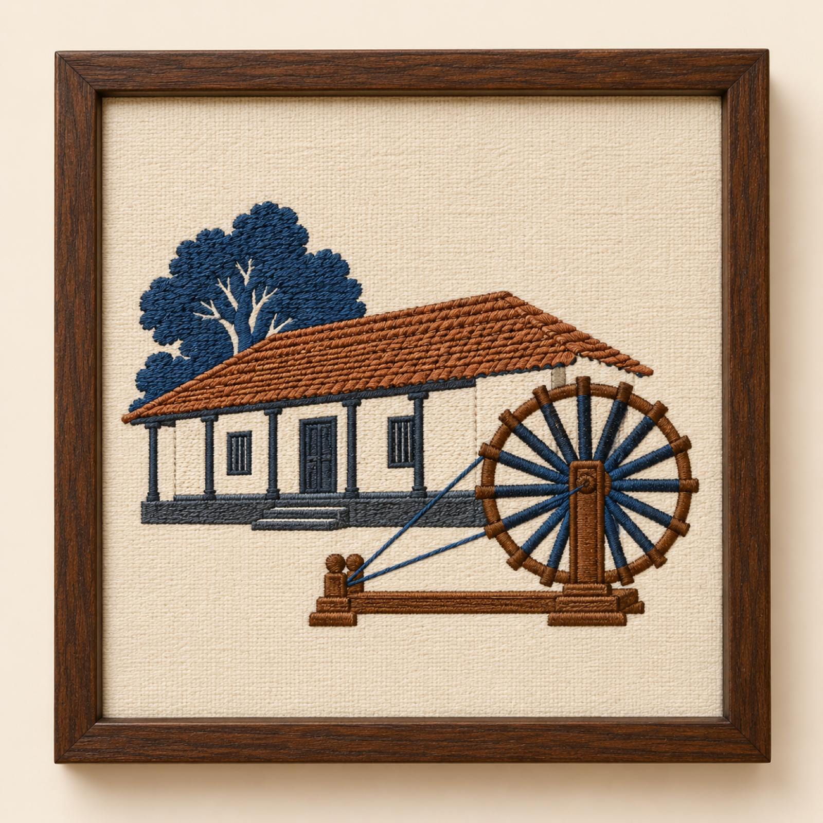 Machine-embroidered Sabarmati Ashram and charkha framed panel, Ahmedabad