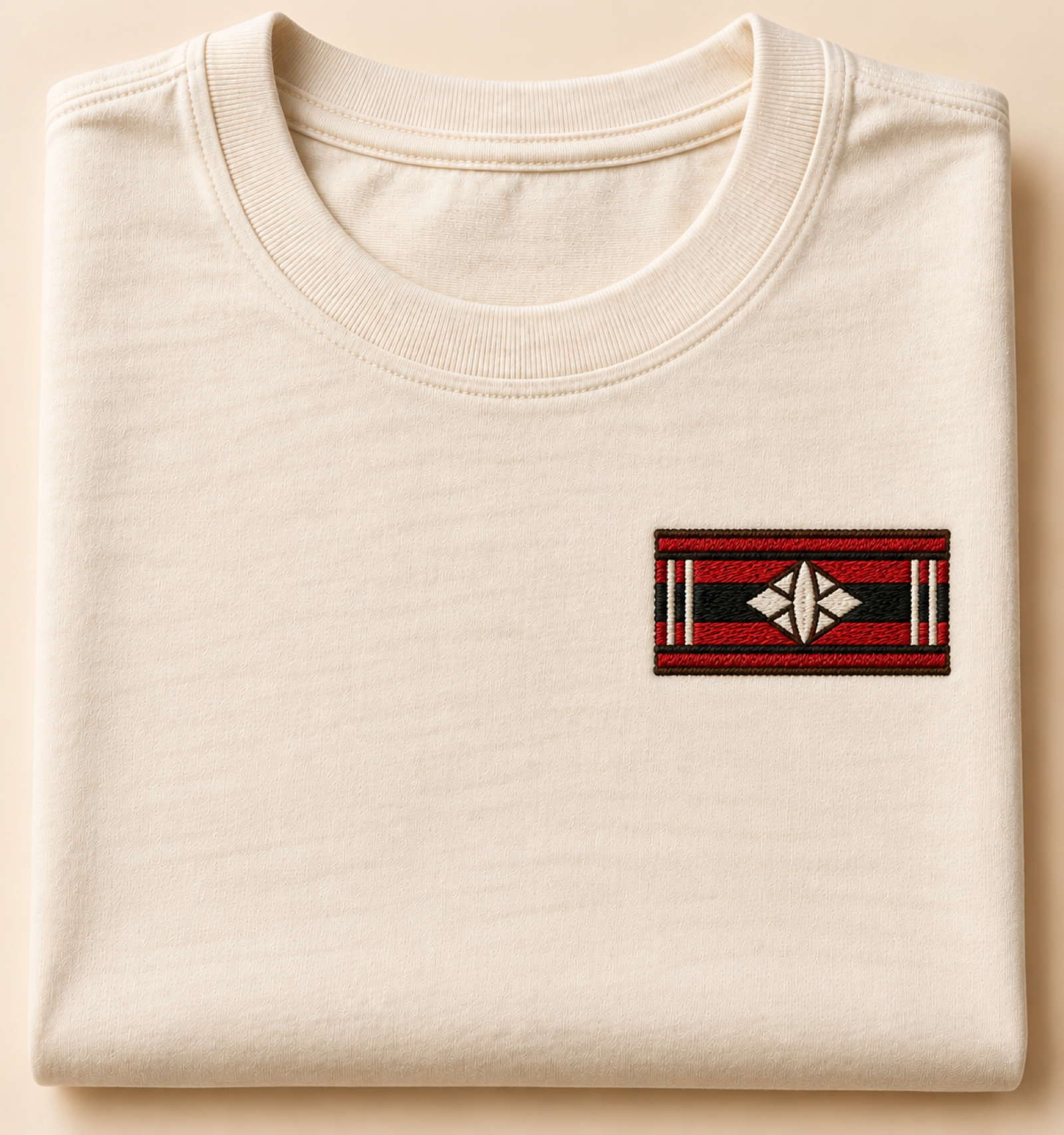 Machine-embroidered Naga shawl geometric band motif on a t-shirt, Nagaland